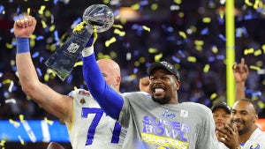 INGLEWOOD, CALIFORNIA - FEBRUARY 13: Von Miller #40 of the Los Angeles Rams holds up the Vince Lombardi Trophy after Super Bowl LVI at SoFi Stadium on February 13, 2022 in Inglewood, California. The Los Angeles Rams defeated the Cincinnati Bengals 23-20. (Photo by Kevin C. Cox/Getty Images)