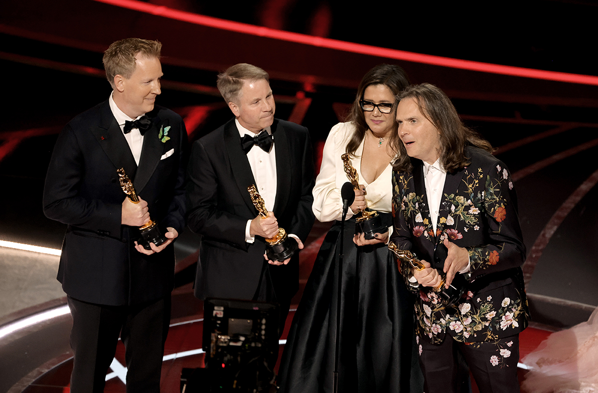 Jared Bush, Clark Spencer, Yvett Merino and Byron Howard accept the Animated Feature Film award for 'Encanto' onstage during the 94th Annual Academy Awards at Dolby Theatre on March 27, 2022 (Getty Images)