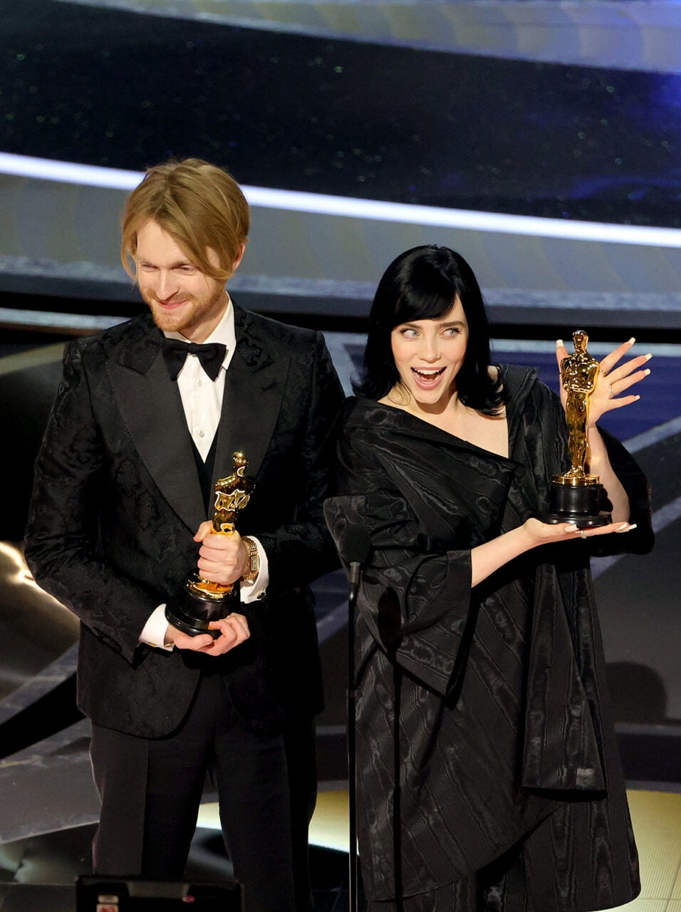 Finneas and Billie Eilish accept the Music (Original Song) award for ‘No Time to Die’ during the 94th Annual Academy Awards at Dolby Theatre on March 27, 2022 (Getty Images) Finneas and Billie Eilish accept the Music (Original Song) award for ‘No Time to Die’ during the 94th Annual Academy Awards at Dolby Theatre on March 27, 2022 (Getty Images)