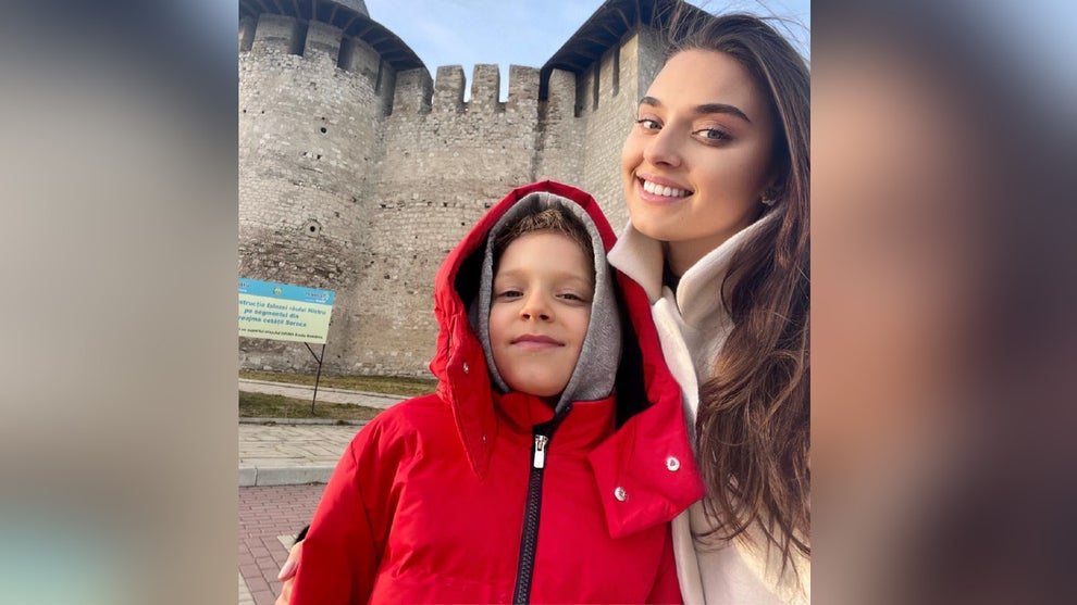 Former Miss Ukraine Veronika Didusenko and her son. (Credit: Family Photo)