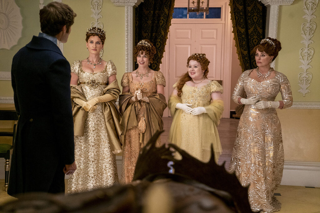 Rupert Young as Lord Jack Featherington, Bessie Carter as Prudence Featherington, Harriet Cains as Philipa Featherington, Nicola Coughlan as Penelope Featherington, Polly Walker as Lady Portia Featherington in episode 201 of "Bridgerton" Season 2 (Liam Daniel/Netflix)
