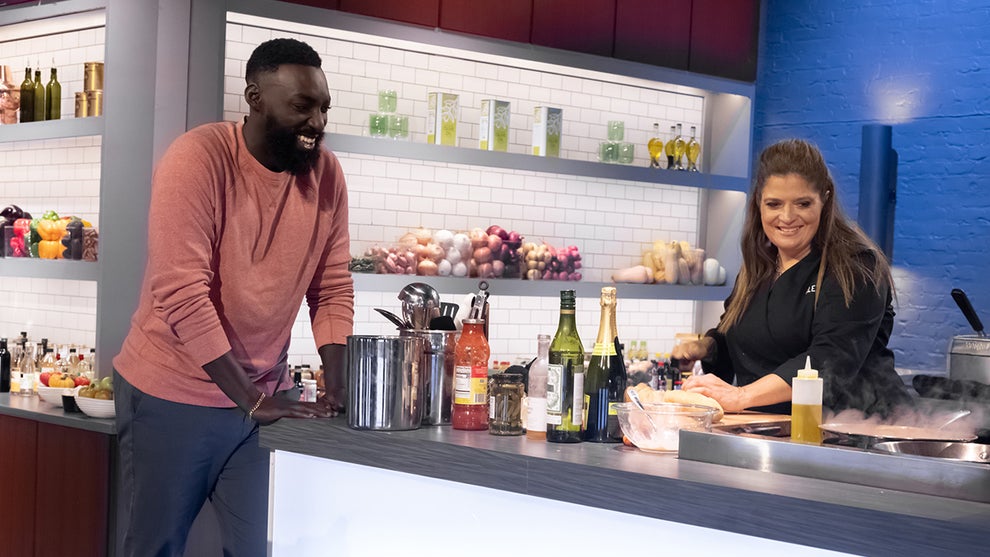 Howt Eric Adjepong and Alex Guarnaschelli on "Alex vs America" (Food Network)