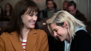Mackenzie Davis and Kristen Stewart in "Happiest Season" (Credit: Hulu)