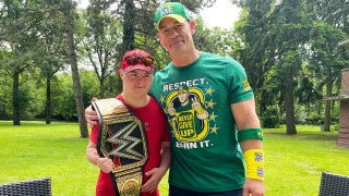 John Cena Surprises a Young Down Syndrome Fan Fleeing Ukraine (Video)
