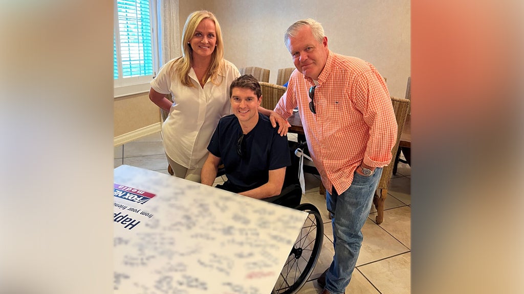 Fox News correspondent Ben Hall with Fox News CEO Suzanne Scott and president and executive editor Jay Wallace (Fox News)