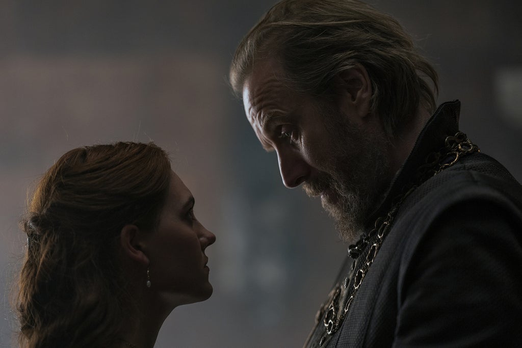 Emily Carey as Alicent Hightower and Rhys Ifans as Otto Hightower in "House of the Dragon" Episode 1 (HBO)