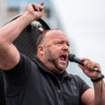 Alex Jones’ Ex-Wife Says His Onscreen Mania Is Not an Act: He’s Crazy Like Charles Manson (Video)