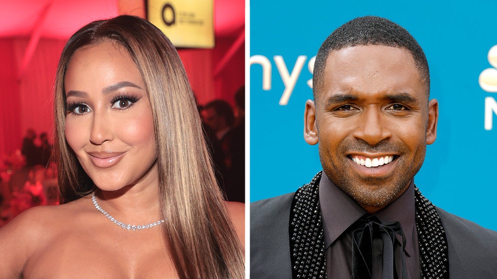 Adrienne Bailon-Houghton and E! News’ Justin Sylvester