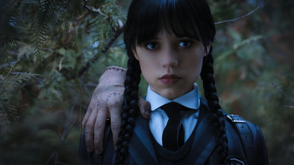 Jenna Ortega as Wednesday and Thing in "Wednesday" / Netflix