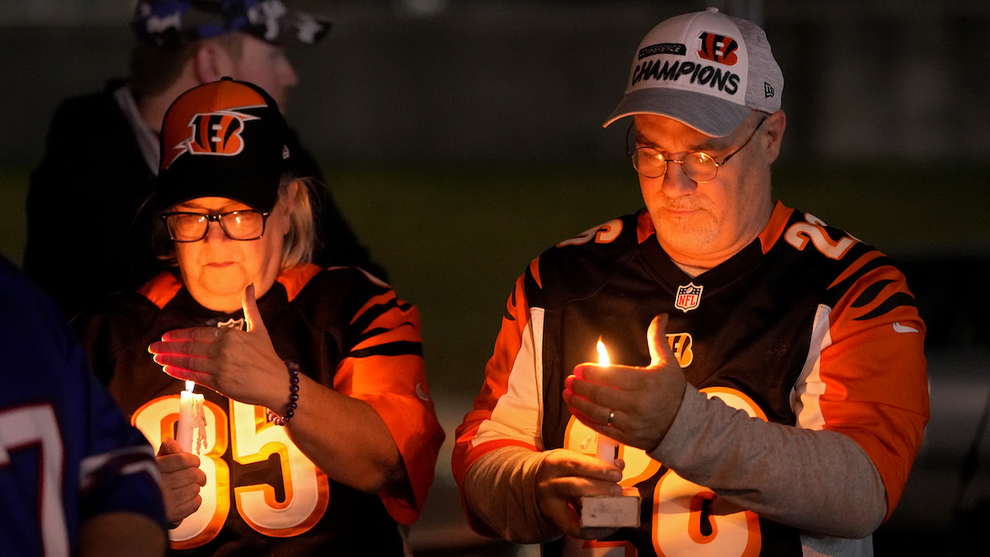 Fans gather for a vigil at the University of Cincinnati Medical Center for football player Damar Hamlin of the Buffalo Bills, who collapsed after making a tackle during the game against the Cincinnati Bengals and was transported by ambulance to the hospital on January 02, 2023 in Cincinnati, Ohio