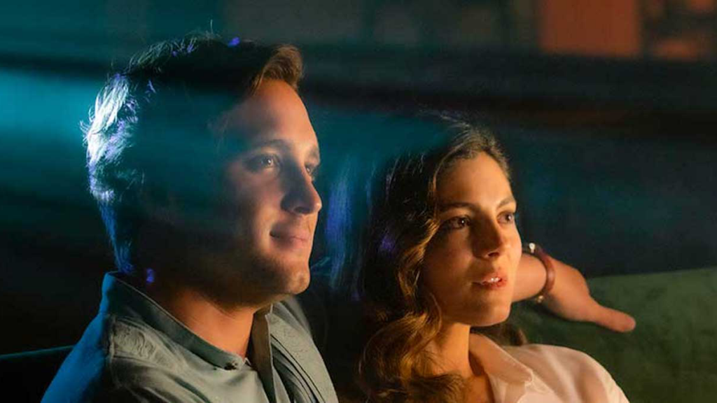 Diego Boneta and Monica Barbaro in At Midnight on Paramount