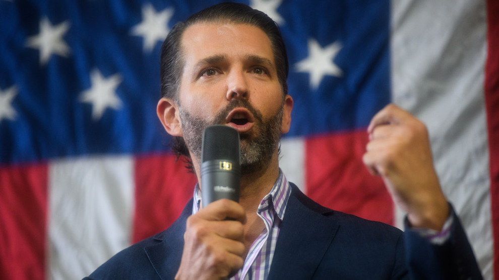 Donald Trump Jr. speaks to audience members before introducing U.S. Senate candidate Rep. Ted Budd during a campaign rally