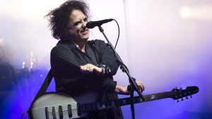 Robert Smith of The Cure performs on the Pyramid stage on day five of Glastonbury Festival