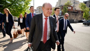 The Fox News legal teams leaves a Delaware court.