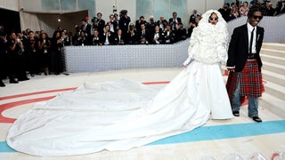 Insane Trains: See Rihanna, Kim Kardashian and Bad Bunny Embrace the Met Gala’s Over-The-Top Trend (Photos)