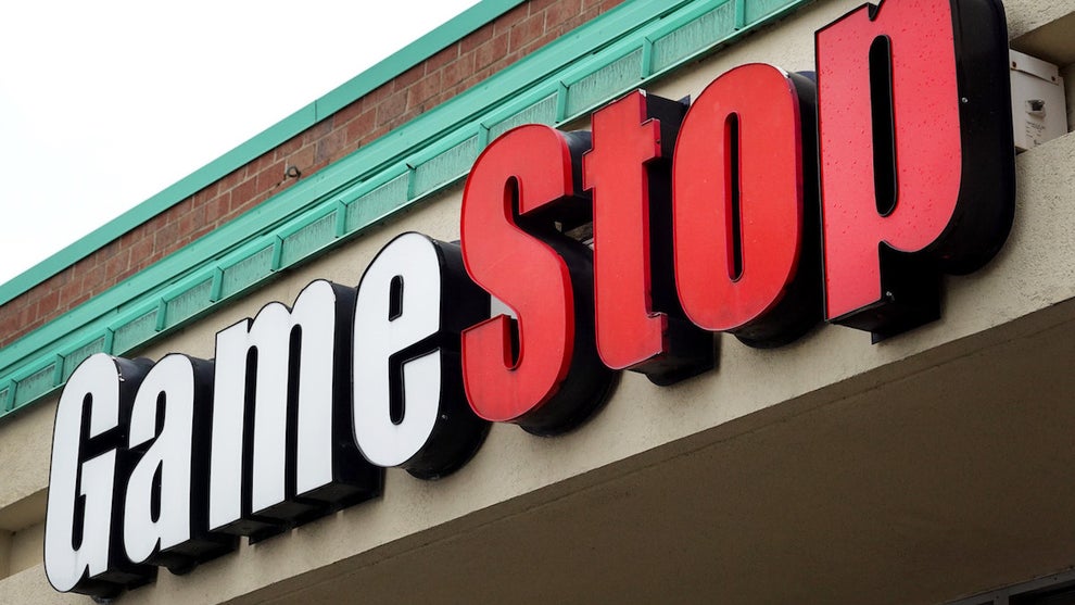 A GameStop store operates in a strip mall in Chicago