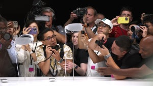 Members of the media inspect the new Apple Vision Pro headset during the Apple Worldwide Developers Conference on June 5, 2023, in Cupertino, Calif. (Photo by Justin Sullivan/Getty Images)