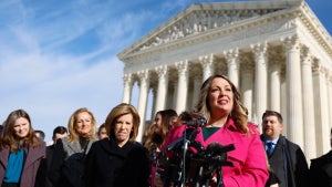 Lorie Smith, the owner of 303 Creative, a website design company in Colorado, speaks to reporters outside of the U.S. Supreme Court Building (Photo Credit: Getty Collection)