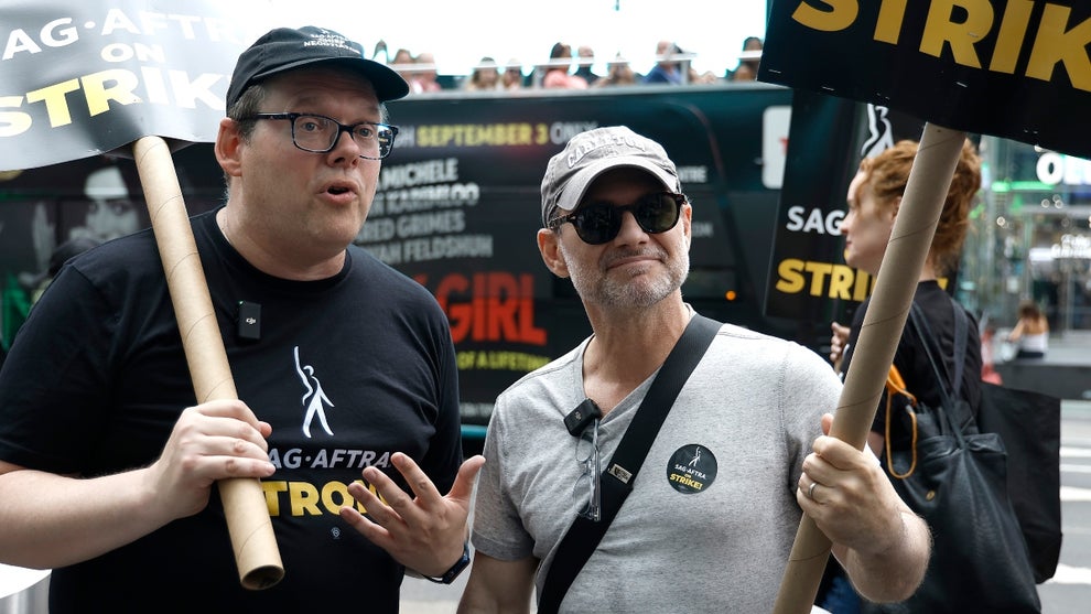 Christian Slater and Duncan Crabtree-Ireland join SAG-AFTRA members and supporters protest as the SAG-AFTRA Actors Union Strike continues in front of Paramount at 1515 Broadway on July 19, 2023 in New York City