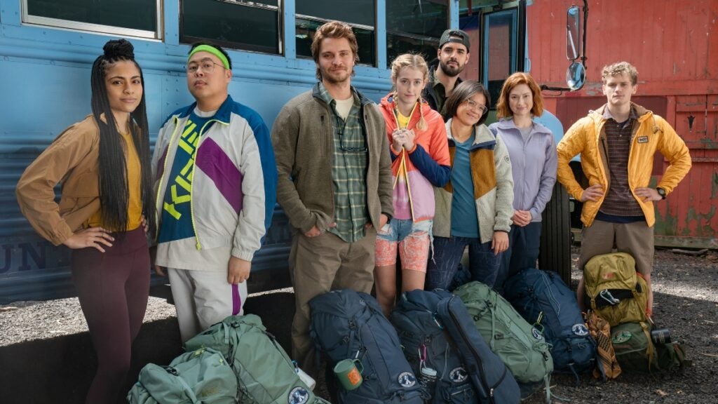 Most of the cast of camping/hike in "Happiness for Beginners": From L to R - Shayvawn Webster, Nico Santos, Luke Grimes, Bus Birney, Esteban Benito, Julia Shiplett, Ellie Kemper and Ben Cook (Netflix)