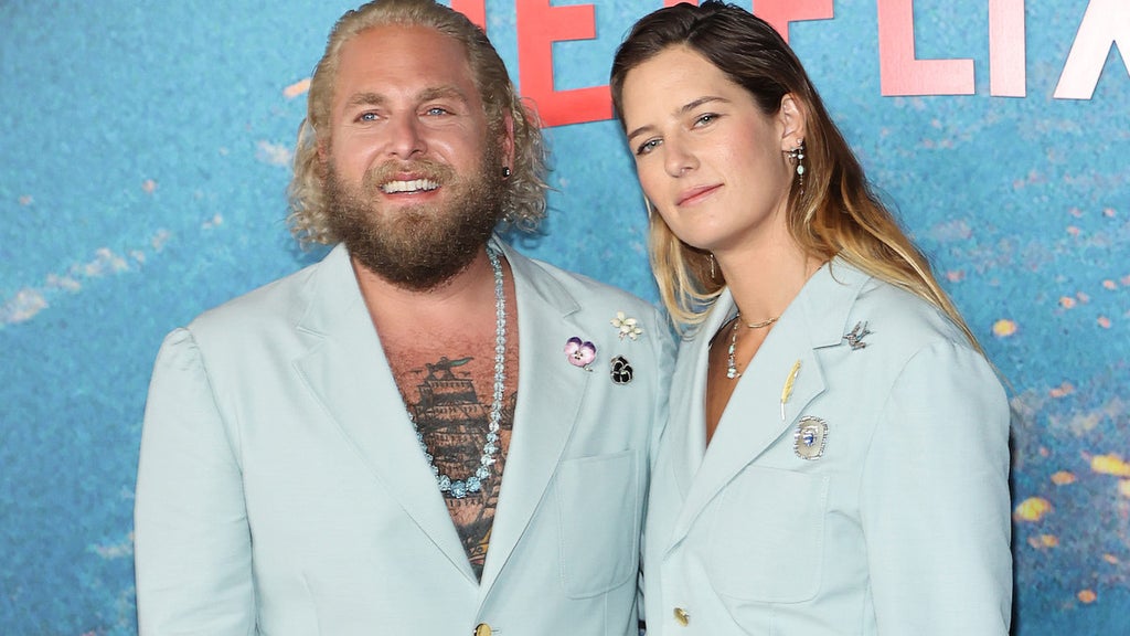 Jonah Hill and Sarah Brady attend the world premiere of Netflix's "Don't Look Up" (Credit: Mike Coppola/Getty Images)