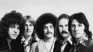 Rock group Journey (l-R Gregg Rolie, Ross Valory, Neal Schon, George Tickner and Aynsley Dunbar pose for a CBS Photo circa 1975. (Photo by Michael Ochs Archives/Getty Images)