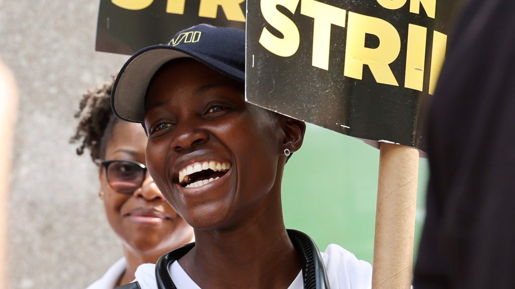 Lupita Nyong'o joins SAG-AFTRA members on the picket line outside of 30 Rockefeller Plaza on July 20, 2023 in New York City. 