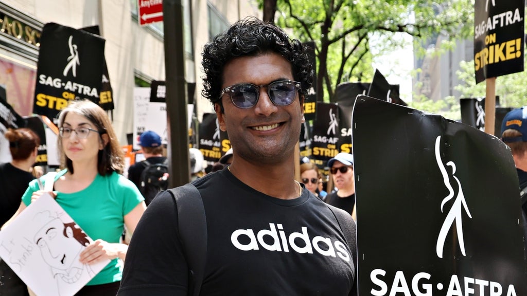 Sendhil Ramamurthy joins SAG-AFTRA members on the picket line outside of 30 Rockefeller Plaza on July 20, 2023 in New York City.