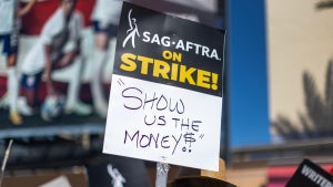 LOS ANGELES, CALIFORNIA - JULY 14: Members of the Hollywood actors SAG-AFTRA union walk a picket line with screen writers outside of FOX Studios on the first day of the actors’ strike which piles on top of the Hollywood writers WGA union strike, now in the 11th week, on July 14, 2023 in Los Angeles, California.