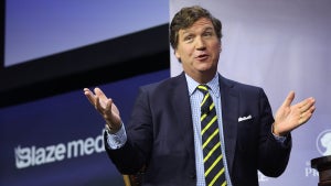 Tucker Carlson speaks to guests at the Family Leadership Summit