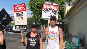 Cat Vasko and fellow WGA member on strike outside of Paramount Studios