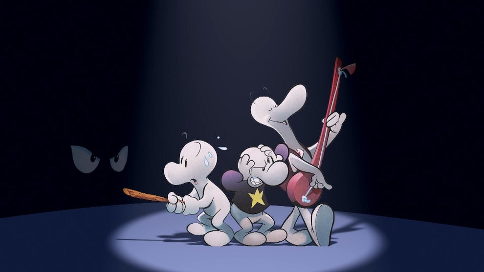 Three simple cartoon figures, stark white, in a spotlight. The one on the left looks scared, the one in the middle wears a star shirt and looks frustrated, and the one on the right happily plays a guitar of some sort
