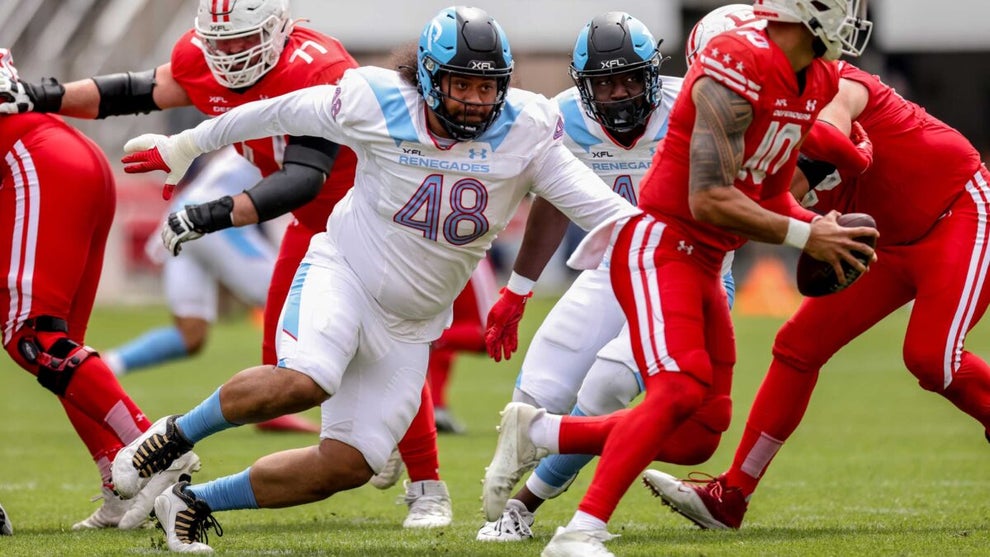Football players on the field during a game.