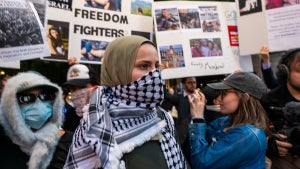 Supporters of both Israel and Palestine engage with each other at Columbia University at on Oct. 12 rally