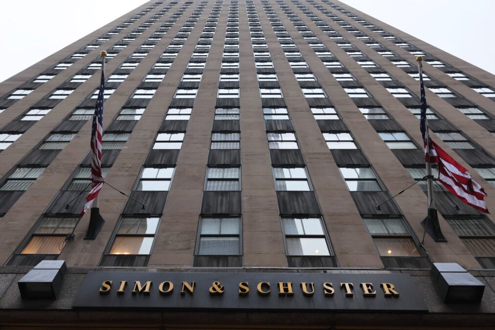 An office building with the name "Simon & Schuster" across the front.