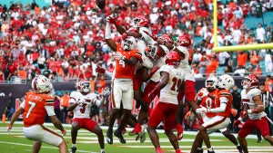 Miami Hurricanes play against the Louisville Cardinals on Nov. 18, 2023