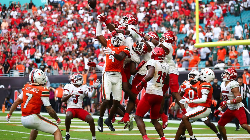 Miami Hurricanes play against the Louisville Cardinals on Nov. 18, 2023