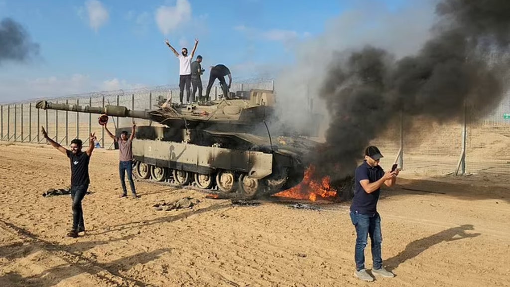 Violence captured by Hassan Eslaiah during Hamas' Oct. 7 attack on Israel (Credit: AP)