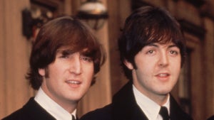 26th October 1965: British pop group The Beatles, from left to right; Ringo Starr, John Lennon (1940 - 1980), Paul McCartney and George Harrison (1943 - 2001), outside Buckingham Palace, London, after receiving their MBE's (Member of the Order of the British Empire) from the Queen. (Photo by Fox Photos/Getty Images)