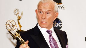 Tom Smothers poses in the press room with his Commemorative Emmy during the 2008 Primetime Emmy Awards in Los Angeles