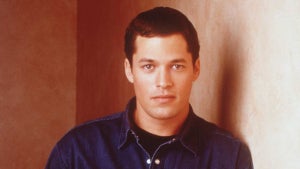 A light-skinned man, David Gail, in a jean shirt poses.