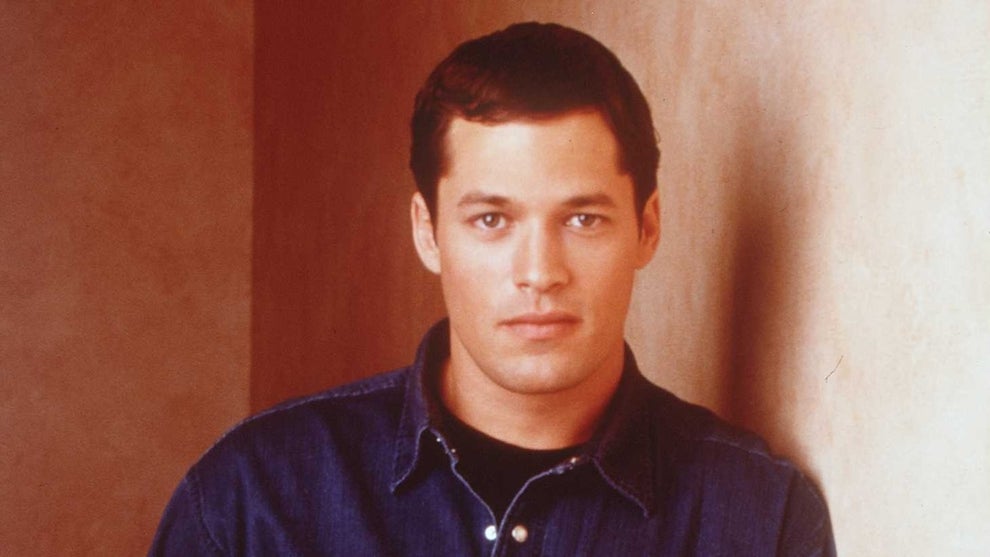 A light-skinned man, David Gail, in a jean shirt poses.