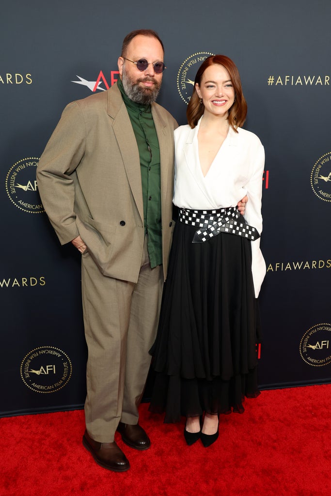 (L-R) Emma Stone and Yorgos Lanthimos attend the AFI Awards Luncheon at Four Seasons Hotel Los Angeles at Beverly Hills on January 12, 2024 in Los Angeles, California.