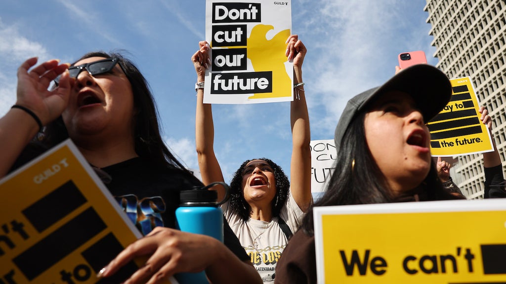 Los Angeles Times Guild members rally outside City Hall against layoffs at the Los Angeles Times newspaper during a one-day walkout on Jan. 19 (Credit: Mario Tama/Getty Images)