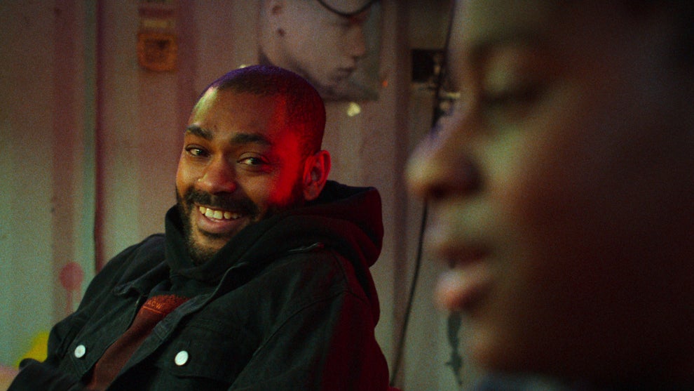 Kane Robinson smiles at Jedaiah Bannerman in Netflix's "The Kitchen"