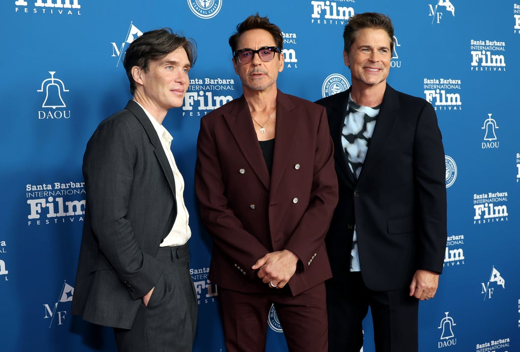(L-R) Cillian Murphy, Robert Downey Jr., and Rob Lowe attend the 39th Annual Santa Barbara International Film Festival: Maltin Modern Master Award Honoring Robert Downey Jr. at The Arlington Theatre on February 09, 2024 in Santa Barbara, California.