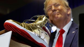 Trump Booed as He Drops $399 Official Gold Sneakers at Sneaker Con | Video