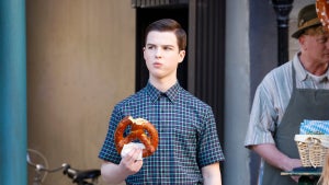 Iain Armitage holds a large pretzel as Sheldon Cooper in "Young Sheldon" Season 7