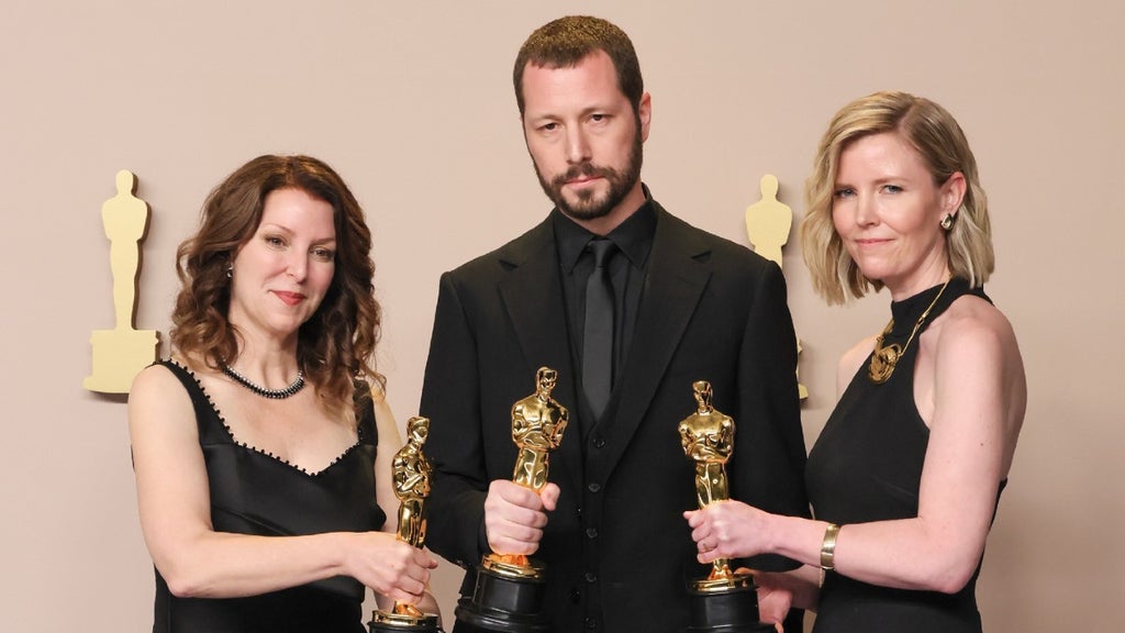 Raney Aronson-Rath, Mstyslav Chernov, and Michelle Mizner, Best Documentary Feature Winners