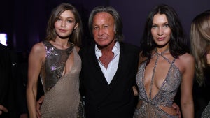 A woman with sandy blond hair on the left, an older man in the middle in a suit, and a woman with black hair on the right. They all have medium-toned skin. The women are both wearing dresses.
